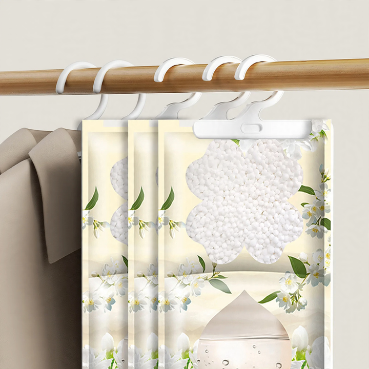 Hanging fragrance dehumidifier for wardrobes