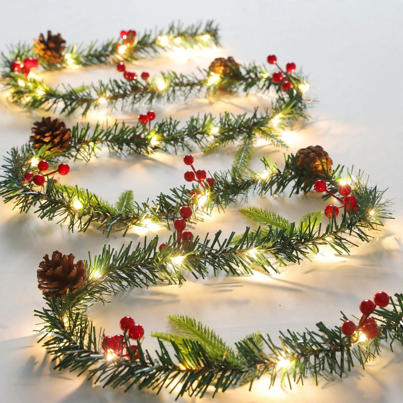 Christmas garlands and wreaths with lighting