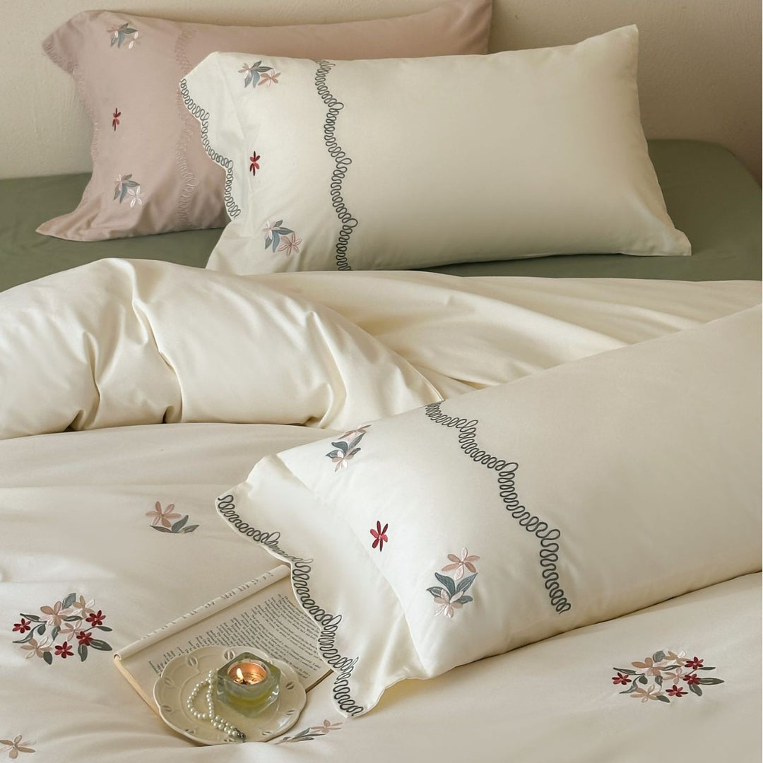 Elegant cotton bedding set with embroidery and bows