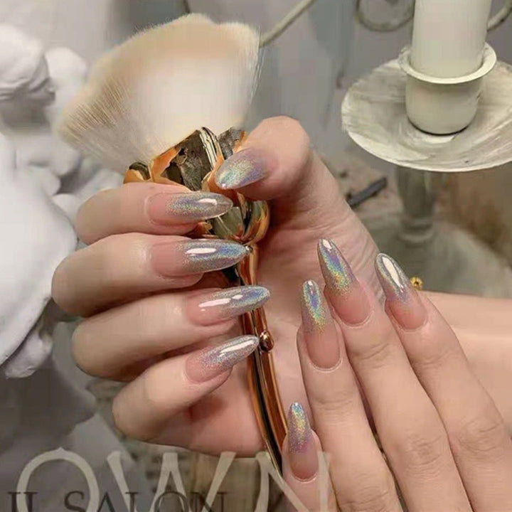 Glitter nail art with holographic effects Stornfield