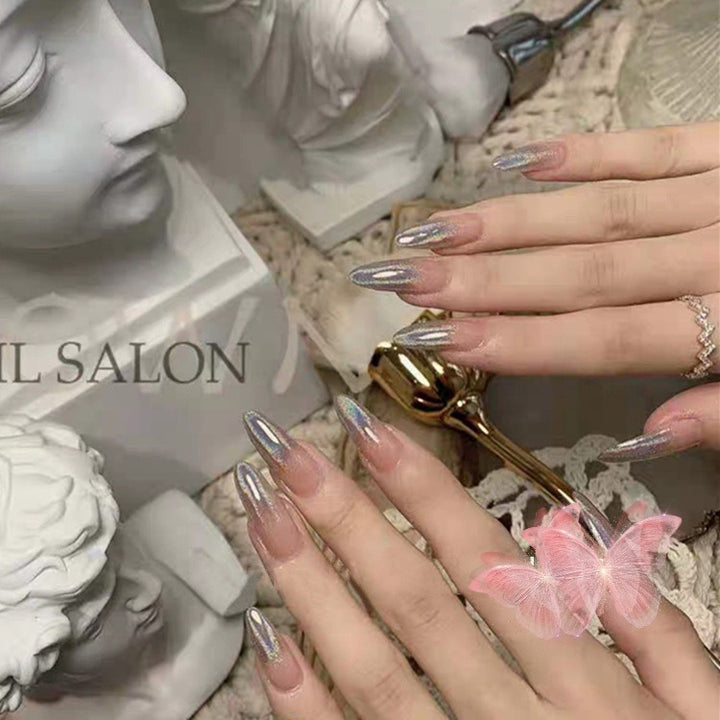 Glitter nail art with holographic effects Stornfield