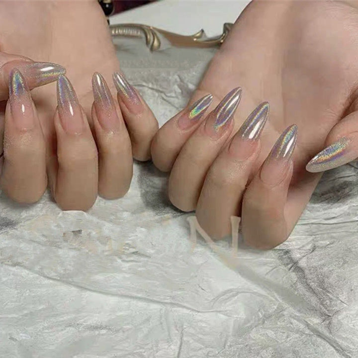 Glitter nail art with holographic effects Stornfield