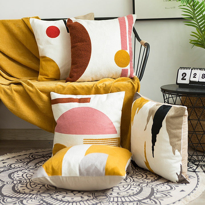Geometric hand-tufted cotton cushion cover with textured appliqué