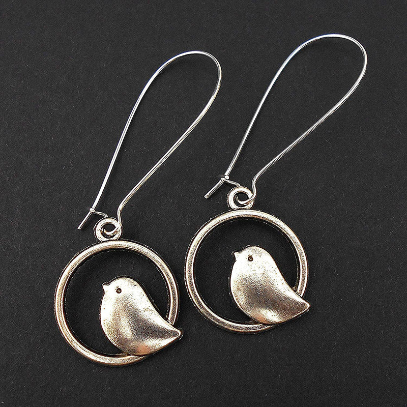 Bird-Themed Dangle Earrings Stornfield