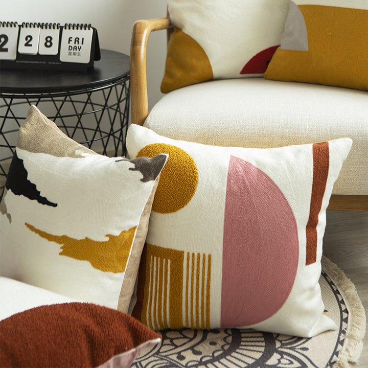Geometric hand-tufted cotton cushion cover with textured appliqué