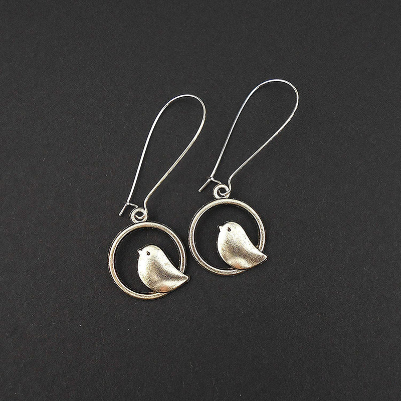 Bird-Themed Dangle Earrings Stornfield