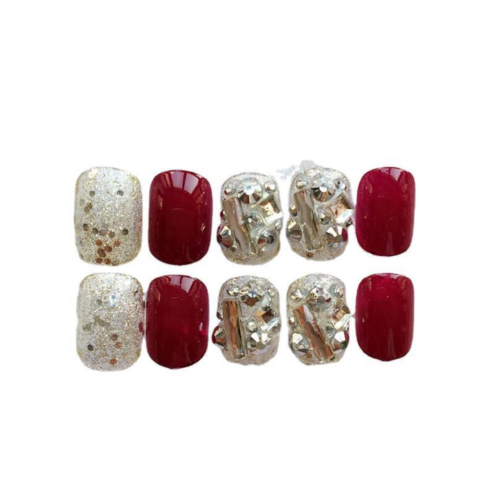 Nail art with luxurious glitter and floral design Stornfield