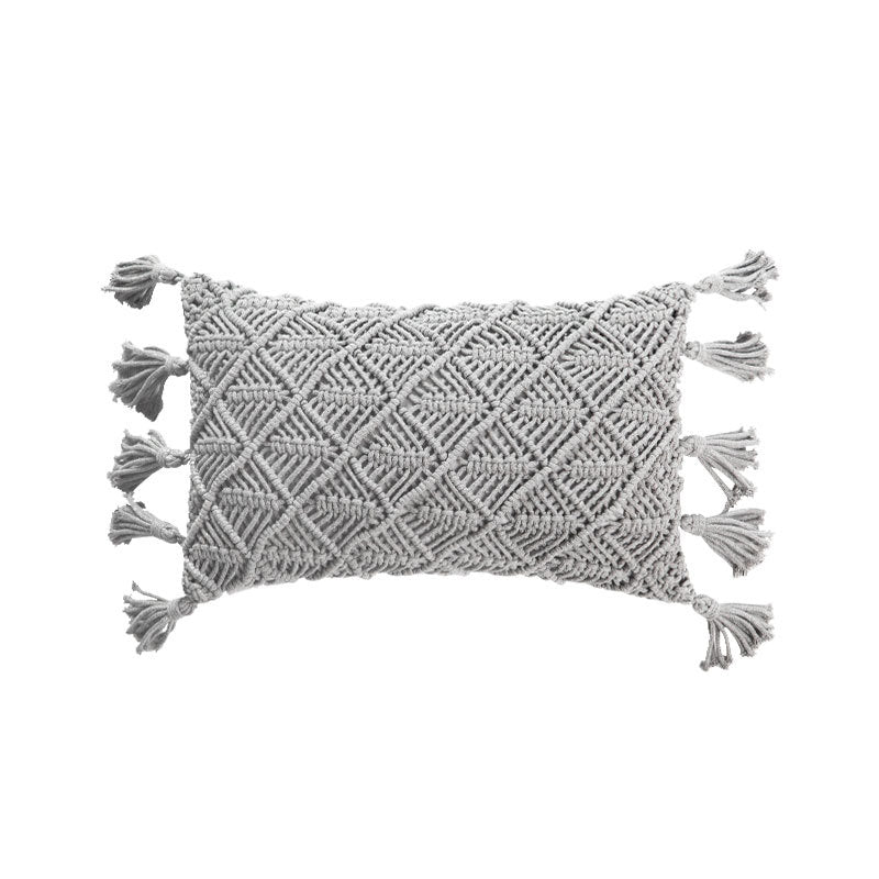 Rectangular cushion cover in macramé style with tufted floral appliqués and fringes