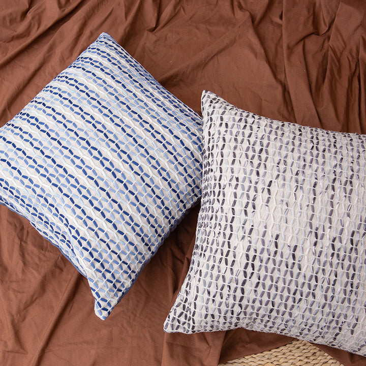 Decorative square cushion cover made of cotton-linen with tufted stripes and bouclé accents