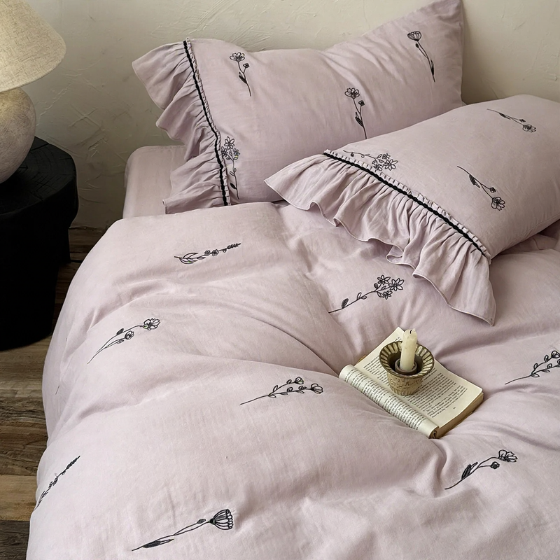 Bedding set made of cotton with floral embroidery and ruffles