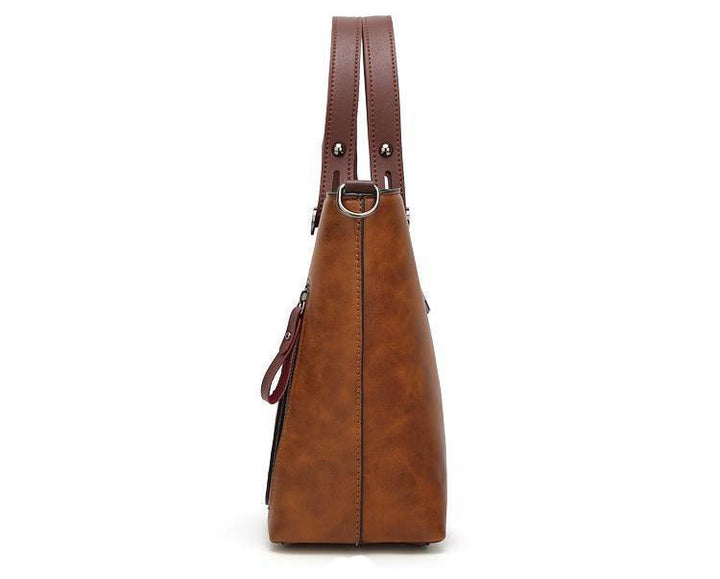 Cera - Vintage handbag with double front pocket | Stornfield