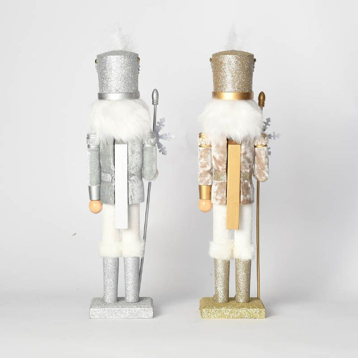 Decorative nutcracker figure made of wood with snowflake design