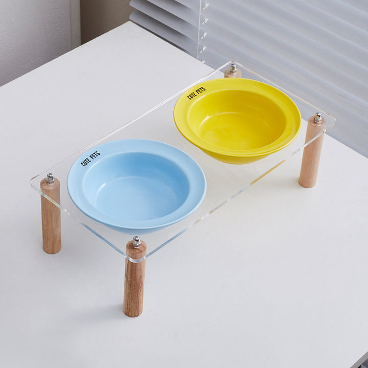 Ceramic double bowl with elevated stand