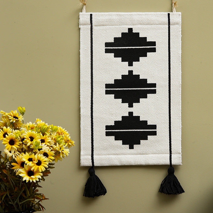 Woven wall hanging with graphic ethnic relief and tassels Stornfield