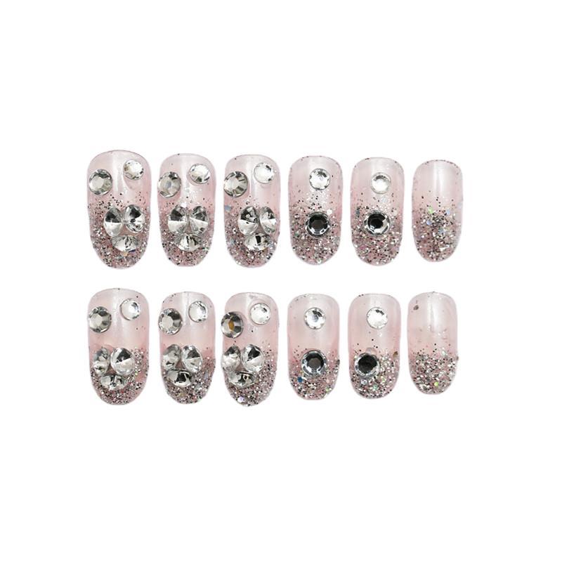 Sparkling artificial nails with rhinestones and sparkling accents Stornfield
