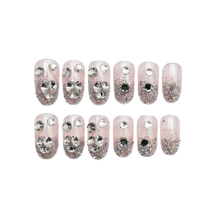 Sparkling artificial nails with rhinestones and sparkling accents Stornfield
