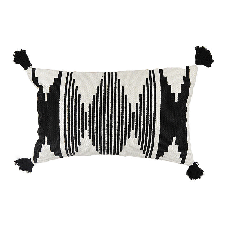 Rectangular Jacquard lumbar cushion cover with geometric ethnic relief and decorative tassels Stornfield