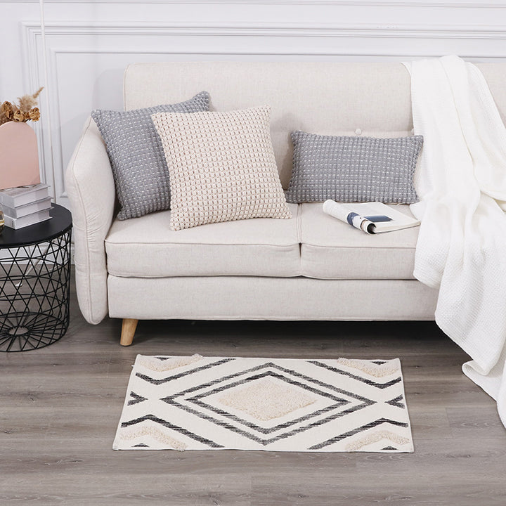Short-pile bathroom and living rug with geometric diamond pattern and anti-slip backing Stornfield