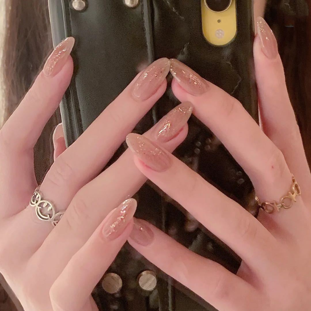 Elegant artificial nails with sparkling glitter Stornfield
