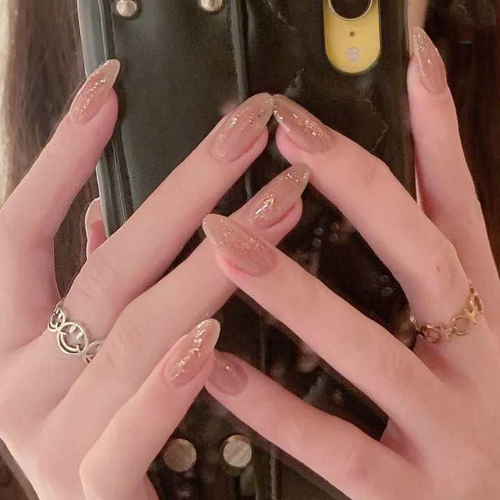 Elegant artificial nails with sparkling glitter Stornfield