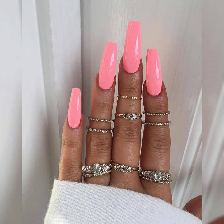 Artificial nail extensions with high gloss finish Stornfield