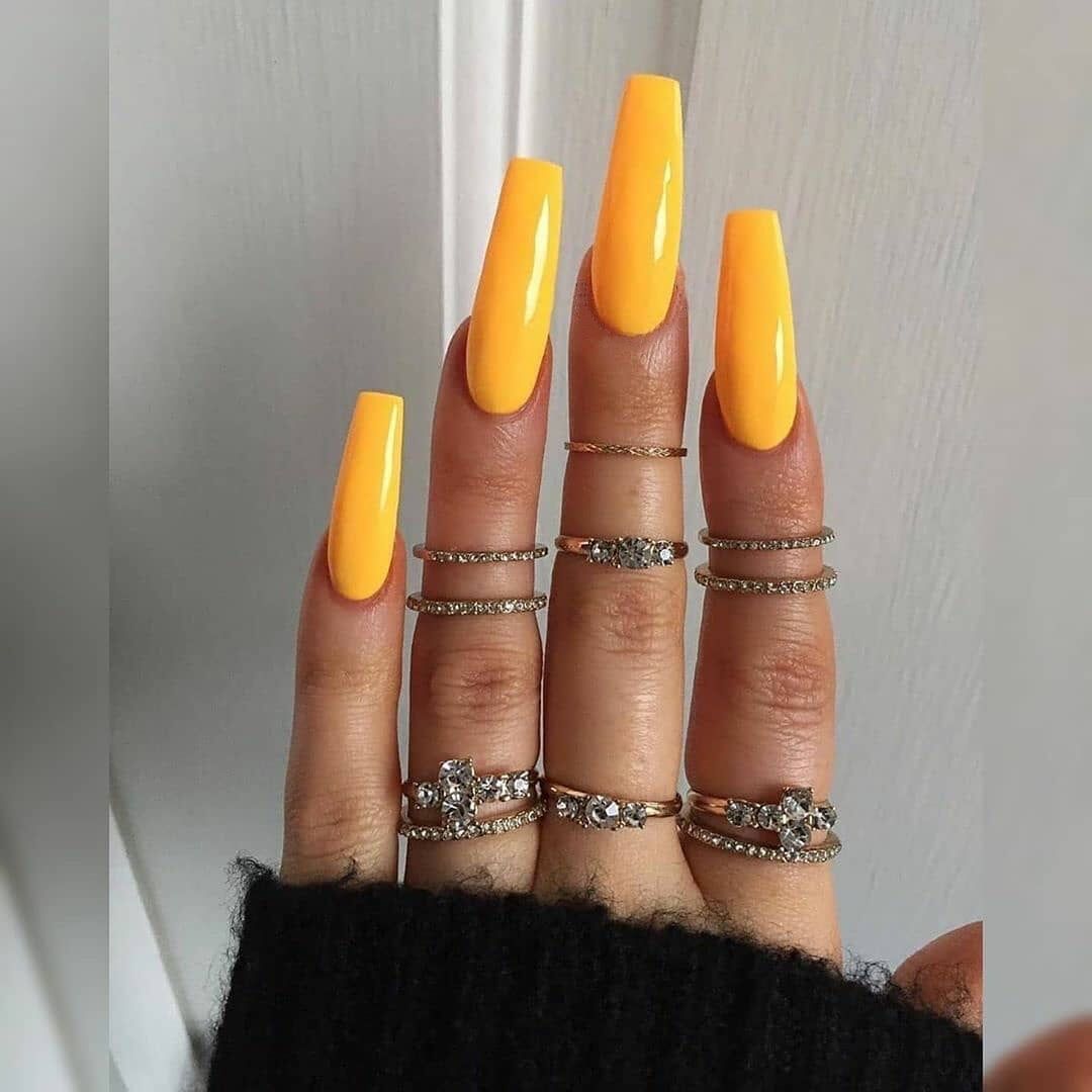 Artificial nail extensions with high gloss finish Stornfield