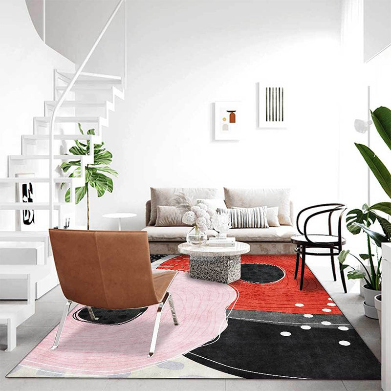 Stornfield | Original living room rug in red and black with color block polka dot pattern Washable and stain-resistant polyester rug Area rug