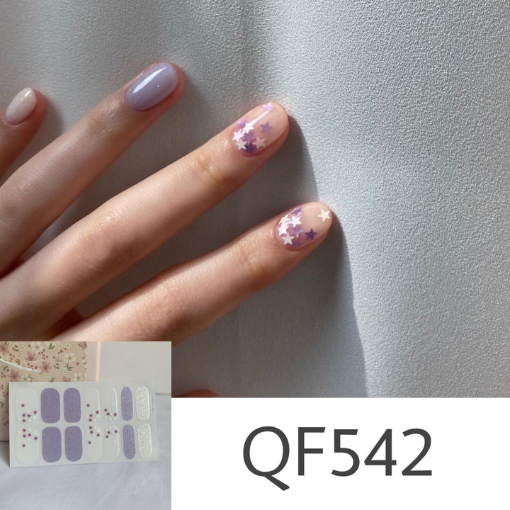 Artificial nail art with star design Stornfield