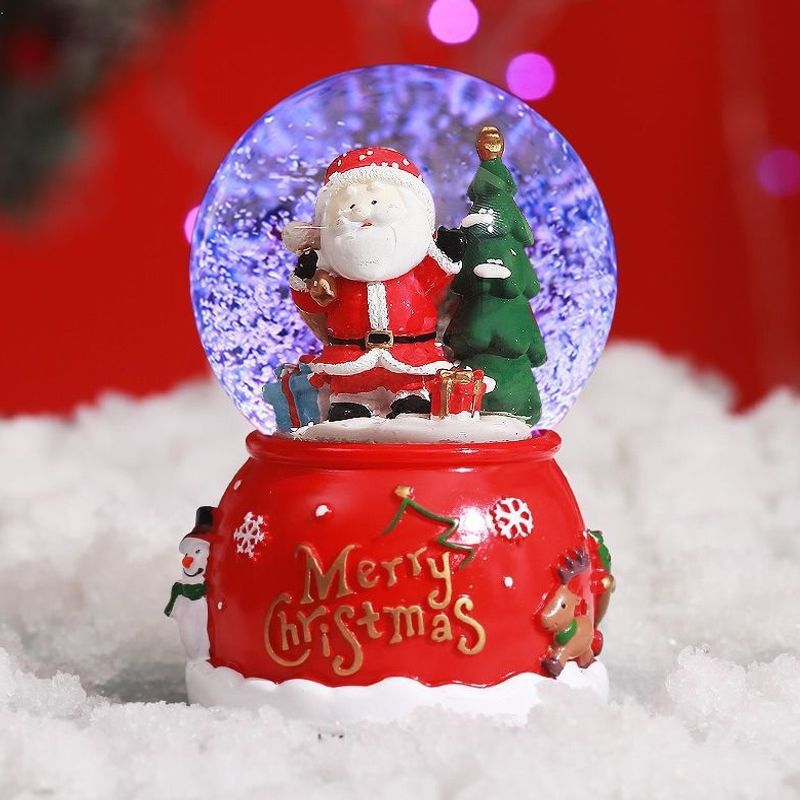 Christmas snow globe with music and light
