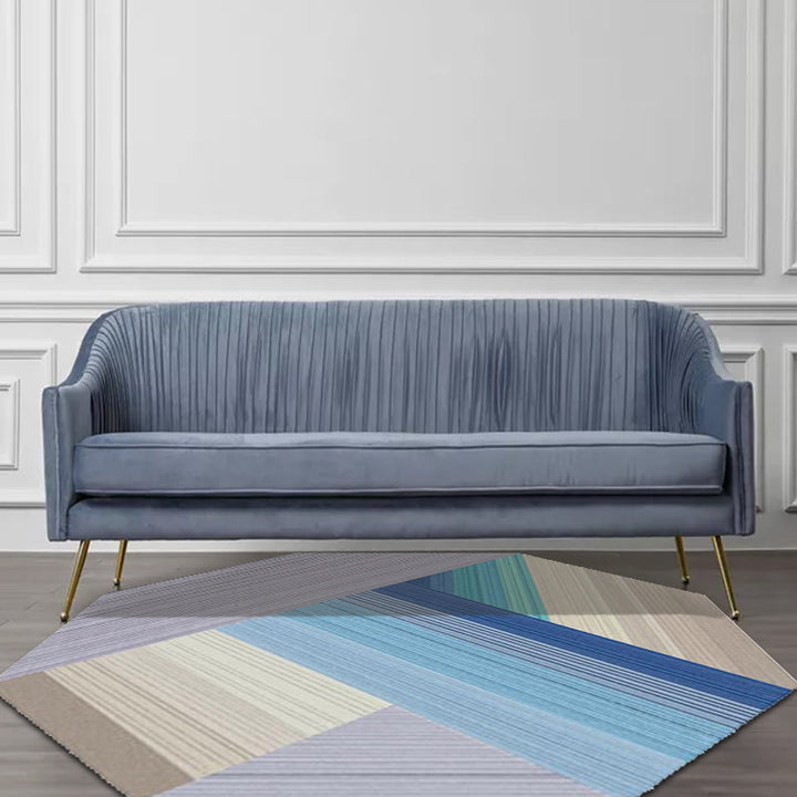 Stornfield | Simple asymmetrical polyester rug with a striped color-block pattern in purple and blue, washable, for home décor