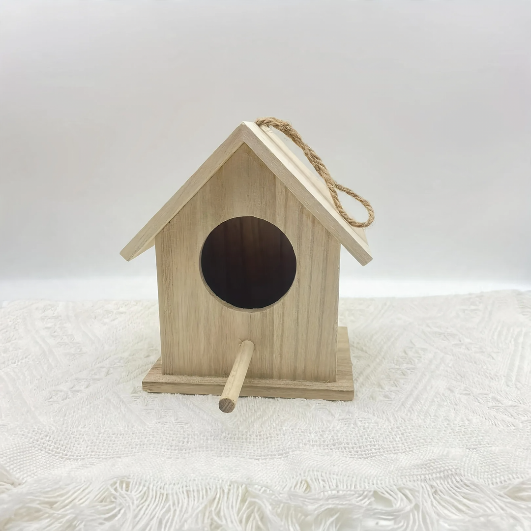 Hanging birdhouse made of solid wood for the garden