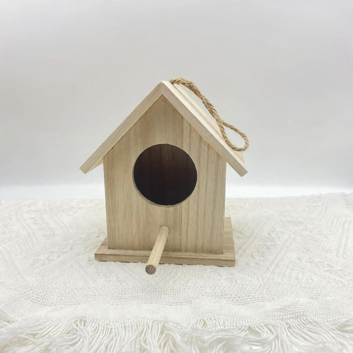Hanging birdhouse made of solid wood for the garden