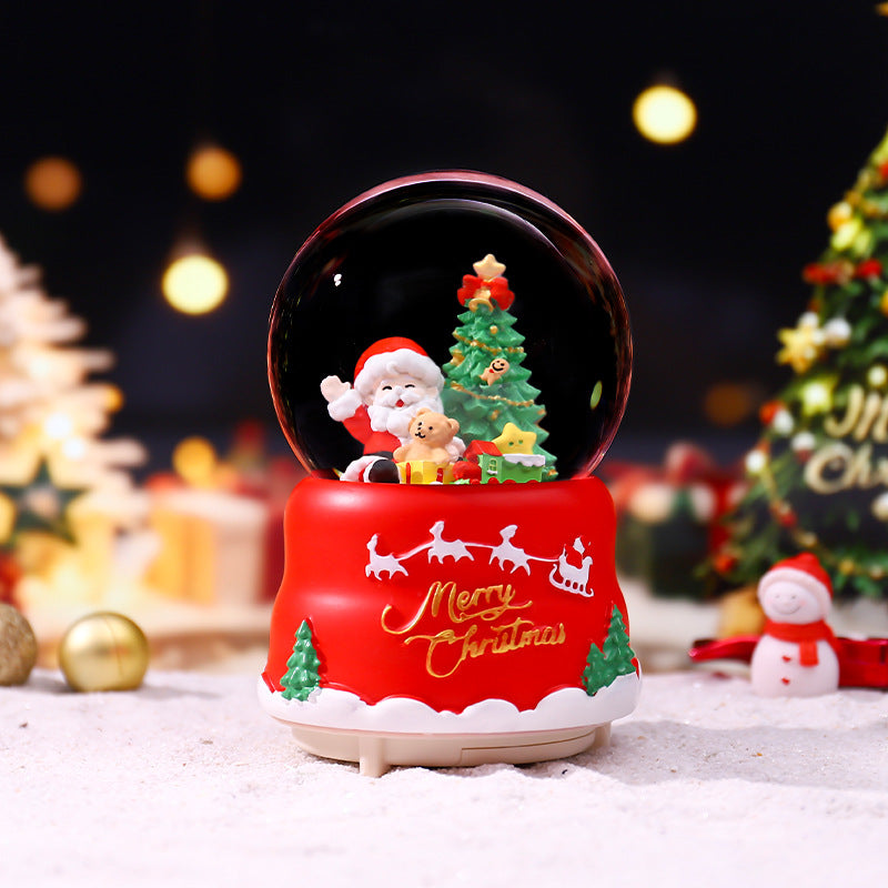 Christmas music box with glass sphere and snow effect