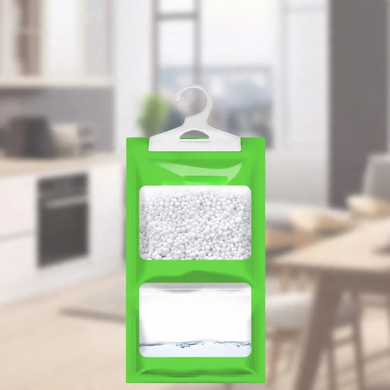 Hanging dehumidifying bag for wardrobes