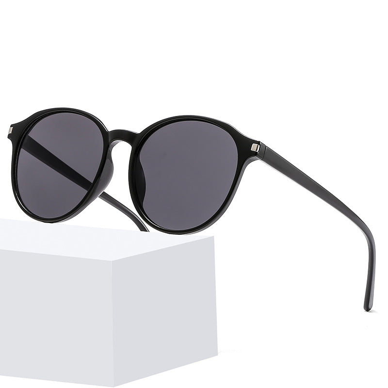 Women's retro-inspired sunglasses with curved frames and UV protection Stornfield