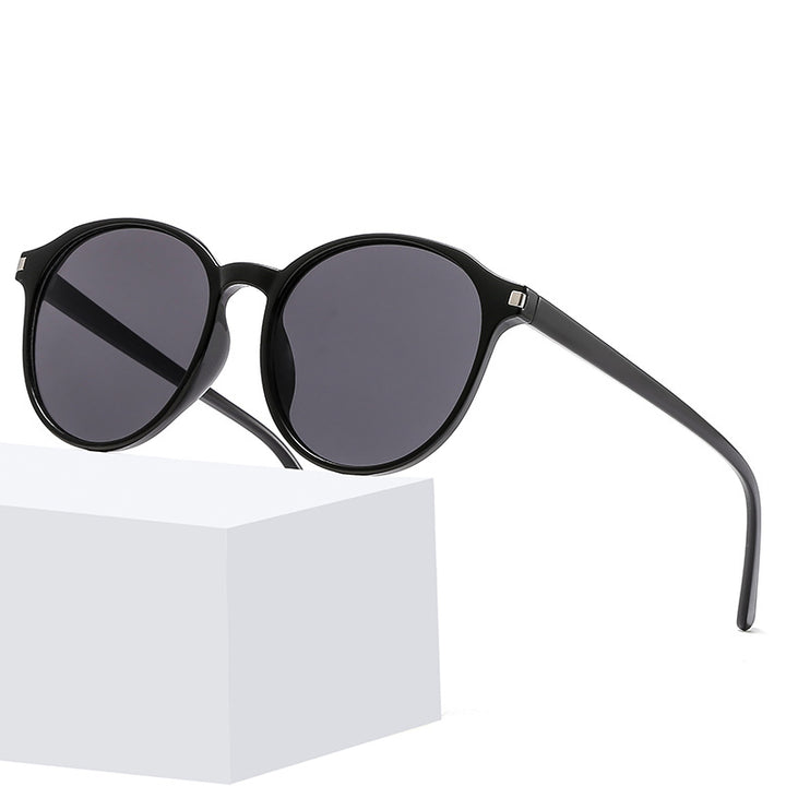 Women's retro-inspired sunglasses with curved frames and UV protection Stornfield