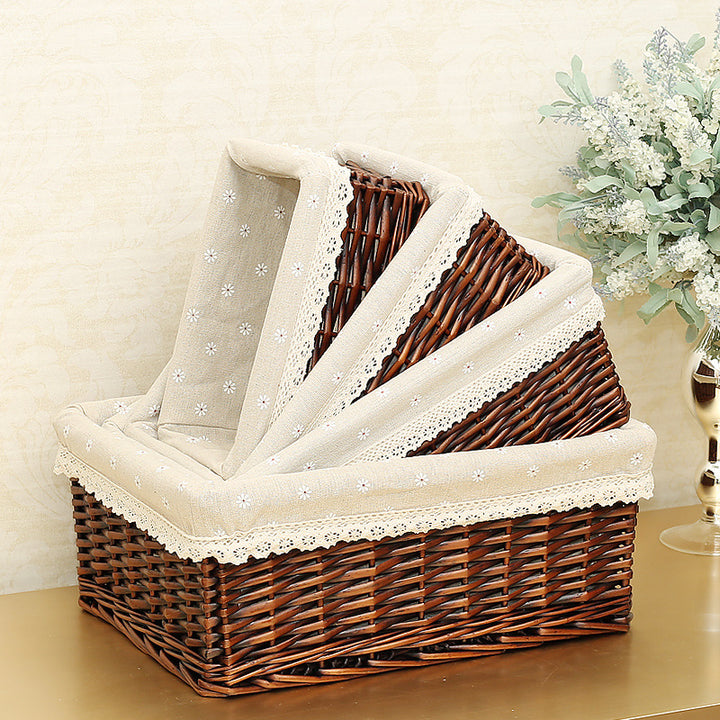 Women's storage basket made of woven natural material with decorative fabric cover Stornfield