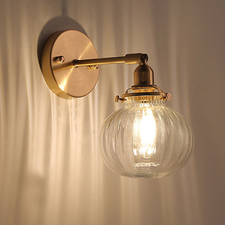 1 Head Wall Mounted Lamp Colonial Orb Clear/Cognac Prismatic Glass Sconce Lighting Fixture in Gold | Stornfield