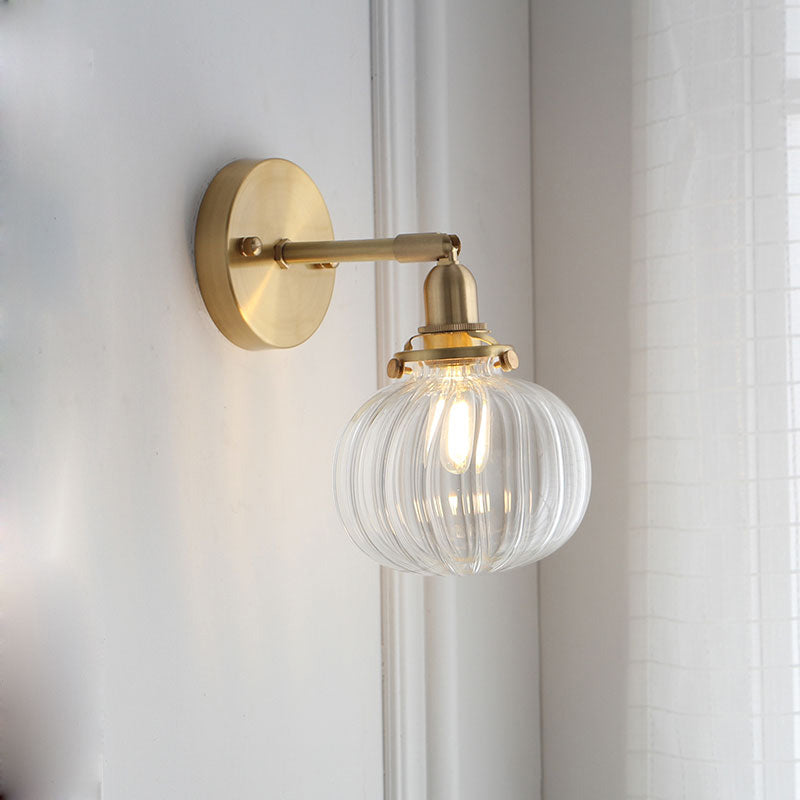 1 Head Wall Mounted Lamp Colonial Orb Clear/Cognac Prismatic Glass Sconce Lighting Fixture in Gold | Stornfield