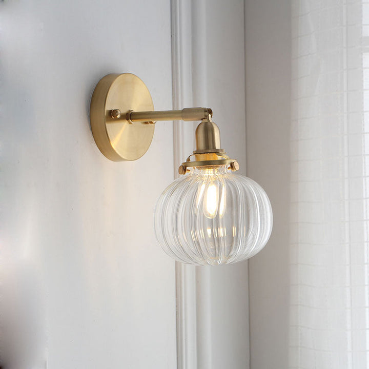 1 Head Wall Mounted Lamp Colonial Orb Clear/Cognac Prismatic Glass Sconce Lighting Fixture in Gold | Stornfield