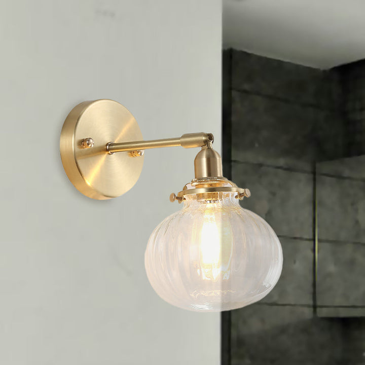 1 Head Wall Mounted Lamp Colonial Orb Clear/Cognac Prismatic Glass Sconce Lighting Fixture in Gold | Stornfield