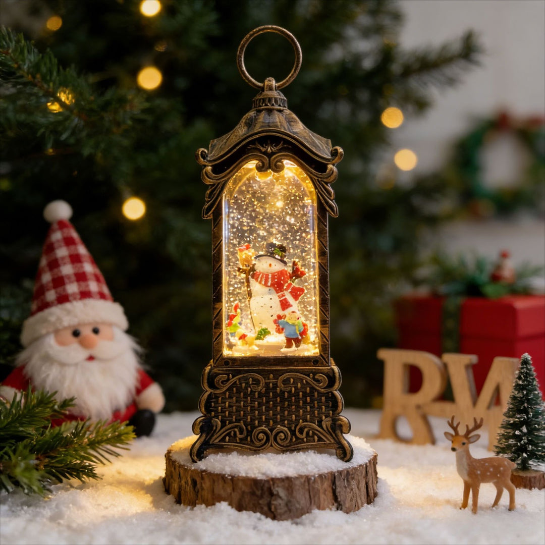 Decorative lantern with snow globe effect