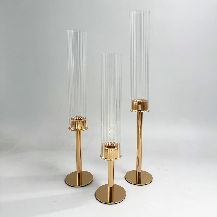 Elegant candle holder made of glass and metal