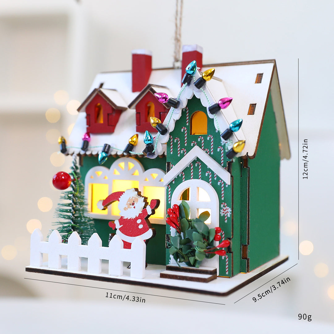 Decorative wooden Christmas house as hanging decoration or display piece