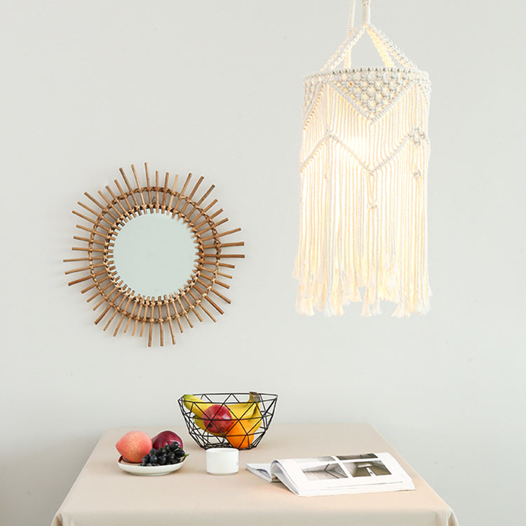 Macramé pendant light with hand-knotted cotton shade and decorative fringes Stornfield