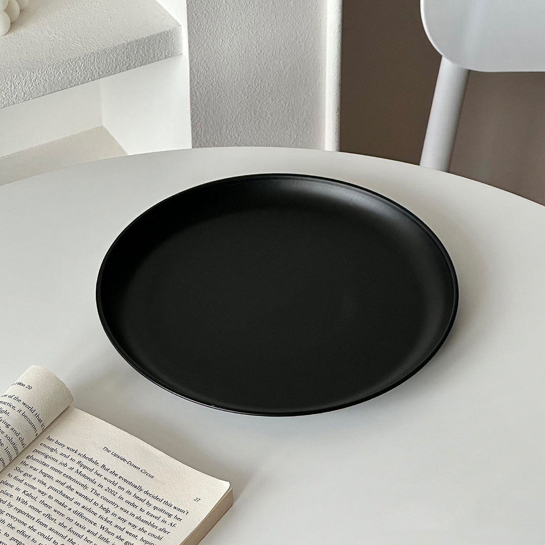 Stainless steel plate, round, 17–23 cm