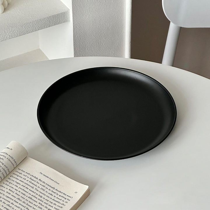 Stainless steel plate, round, 17–23 cm