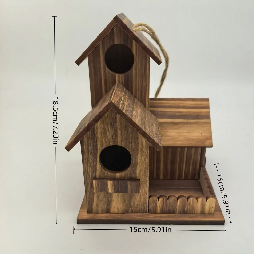 Two-story birdhouse made of carbonized pine wood
