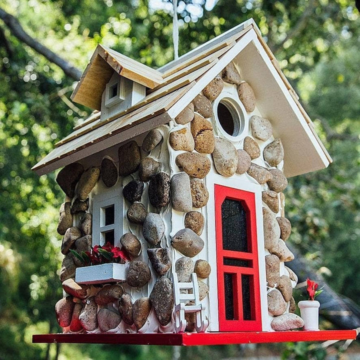 Decorative birdhouse in stone look made of resin