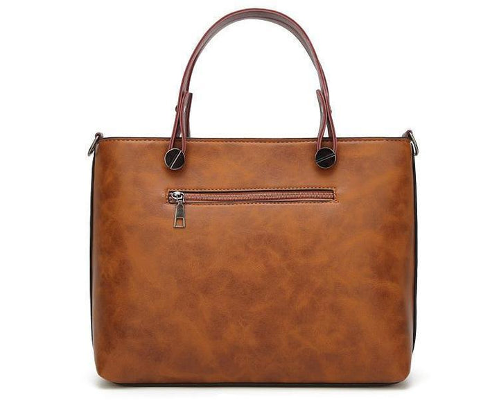 Cera - Vintage handbag with double front pocket | Stornfield
